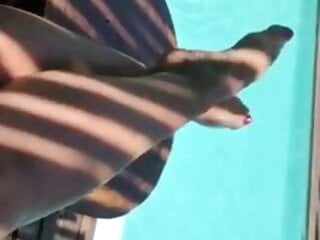 Aryana's scorching toes get within the pool