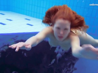 Katka Matrosova swimming bare on my own within the pool