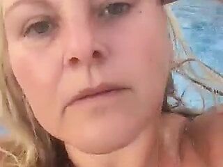Kitty Queen – Simply Nude Swimming – Blonde BBW MILF swimming within the pool