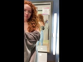 Sexy woman masturbates in public converting room