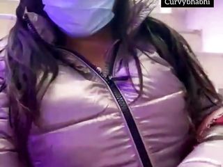 Desi bhabhi appearing her boobs in her jacket in public position