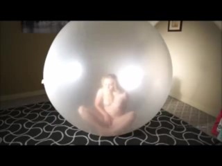 Pop and masturbing within large balloon