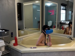 Non-public video of tiny brunette masturbating with giant dildos and VR in tub with massive mirrors
