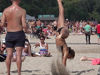 Cheerleaders Unfold Legs on Seashore